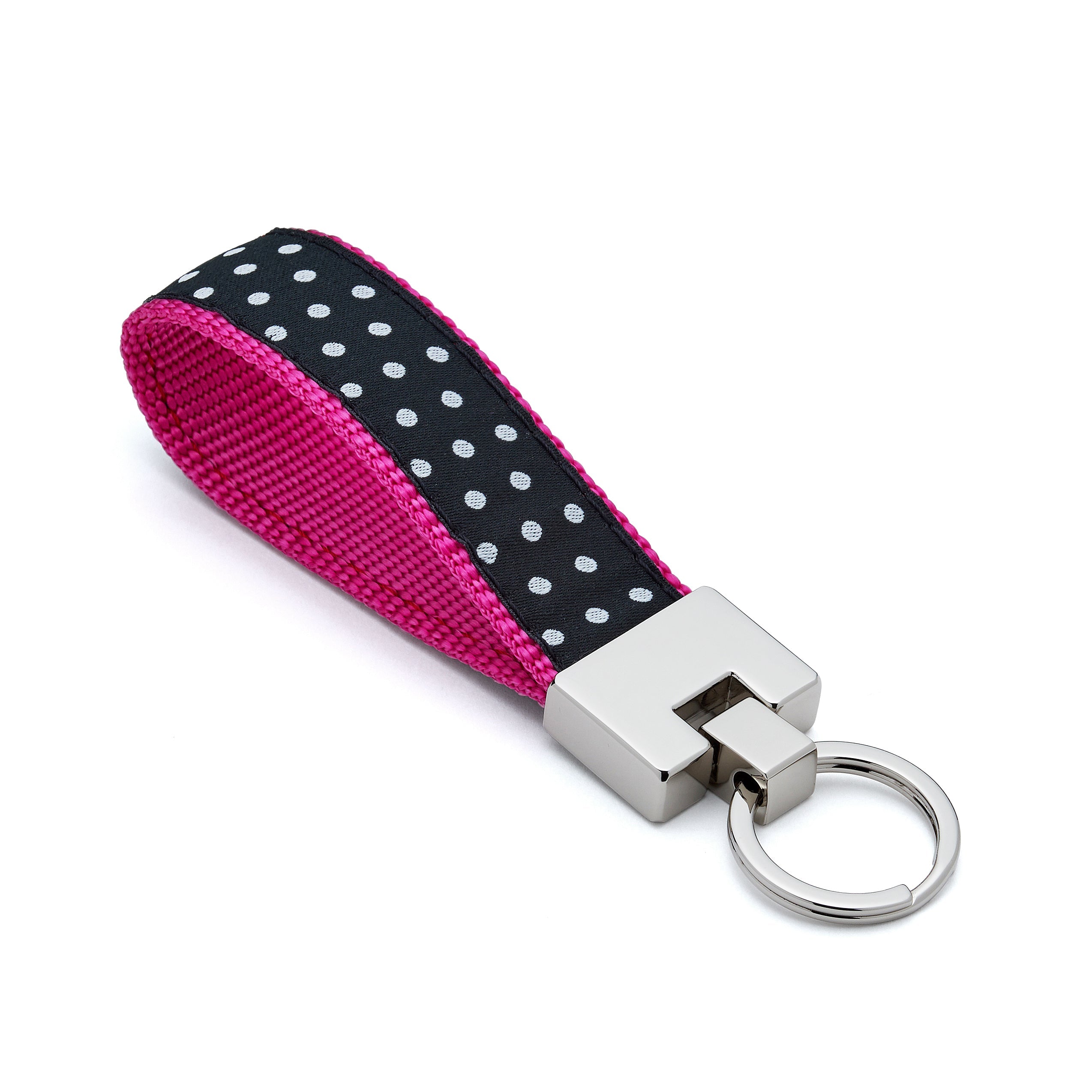 Keychain with pink and black polka dot strap on a white background