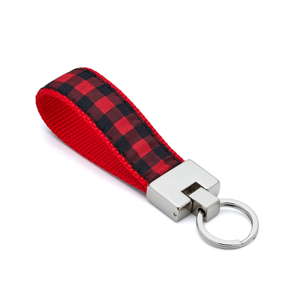 Keychain with red and black plaid strap on a white background lumberjack