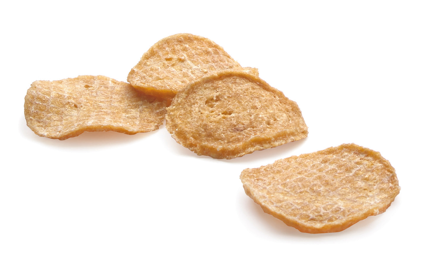 Four dried chicken crisps on a white background
