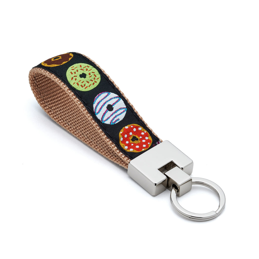 Keychain with colorful donut design on a black background cop gift 