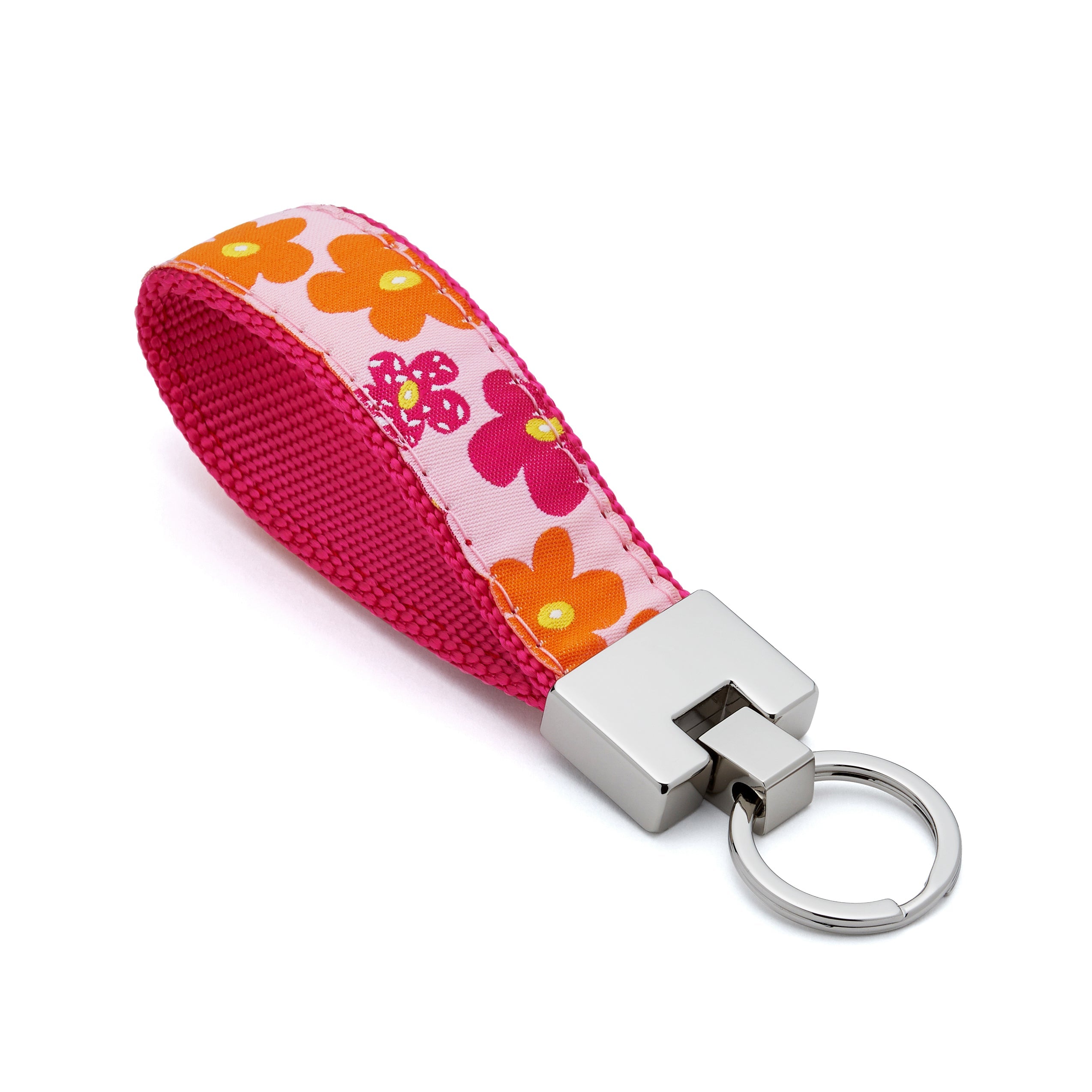 Keychain with floral-patterned pink strap on a white background flowers