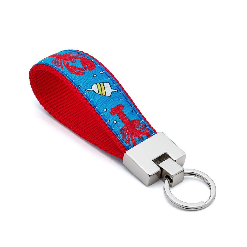 Keychain with red and blue strap featuring lobster and bobber design on a white background