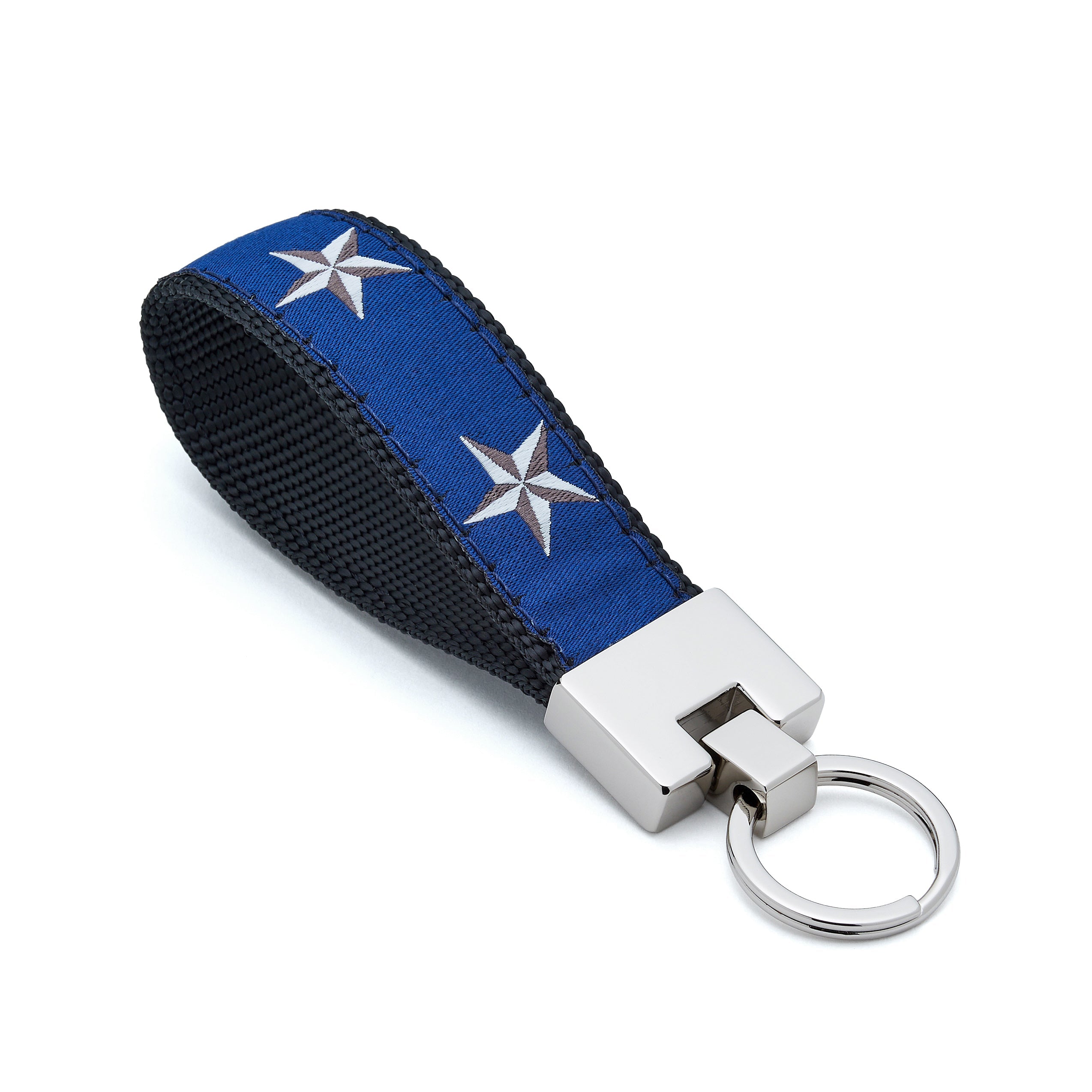 Keychain with blue strap featuring silver stars on a white background