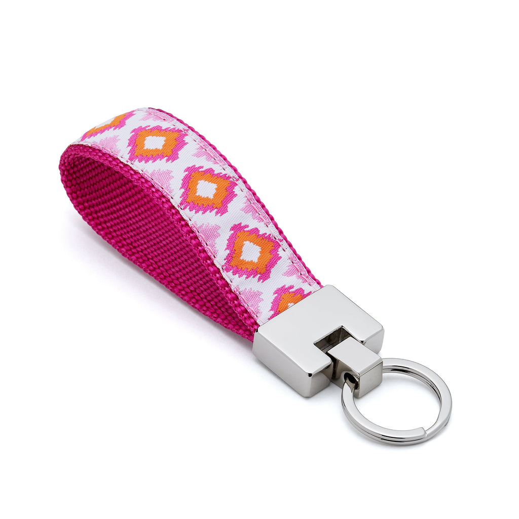Keychain with pink and orange patterned strap on a white background