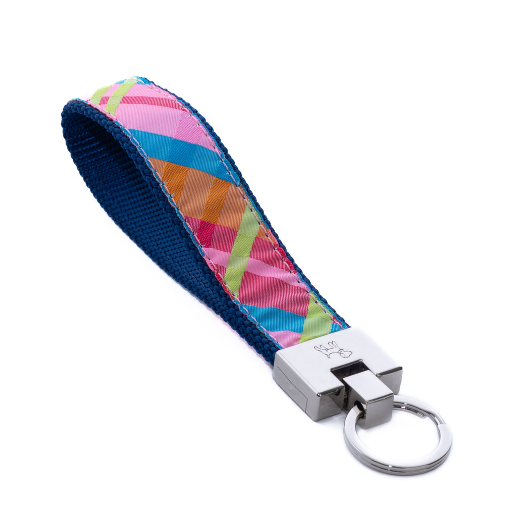 Keychain with colorful strap and metal keyring on a white background madras