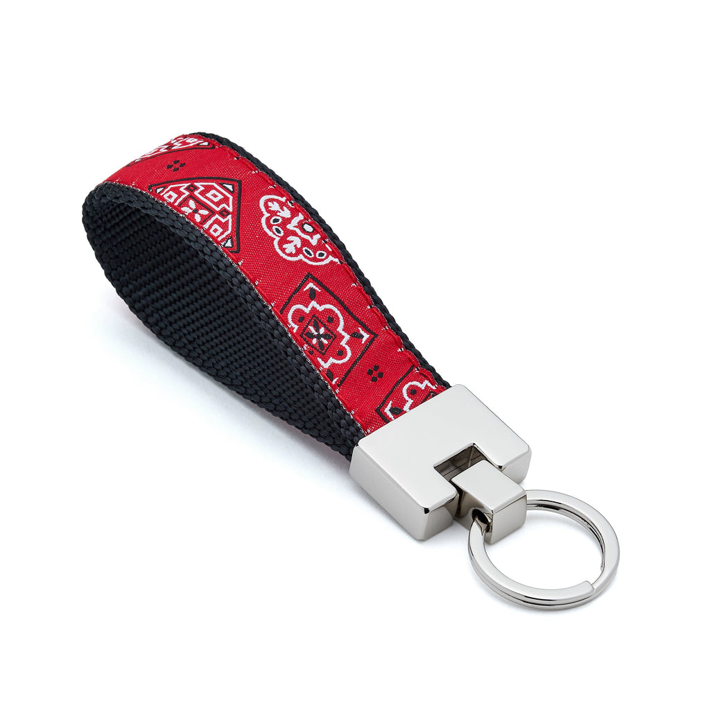 Keychain with red bandana patterned strap on a white background hankerchief