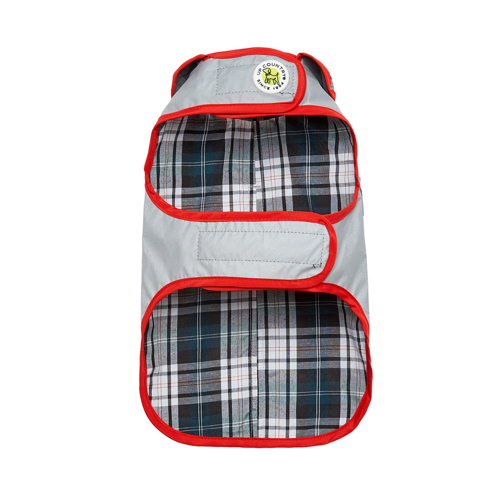 Dog vest with plaid pattern and red trim on a white background